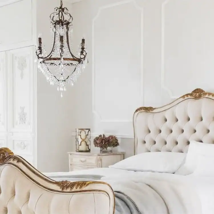 Stylish chandelier in a neutral bedroom