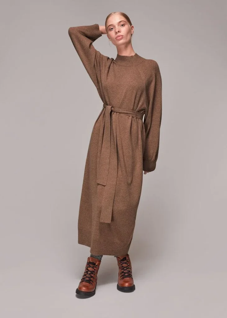 Model wears funnel-neck belted knit dress from Whistles. best knitted dresses