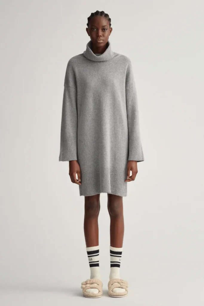 model wears grey jumper dress