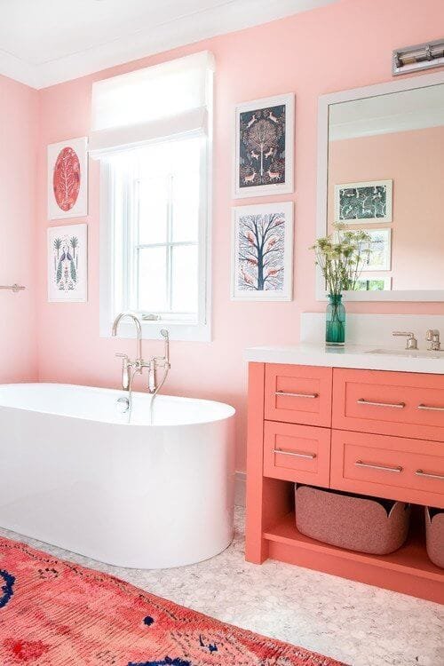 Bright peach colour painted bathroom