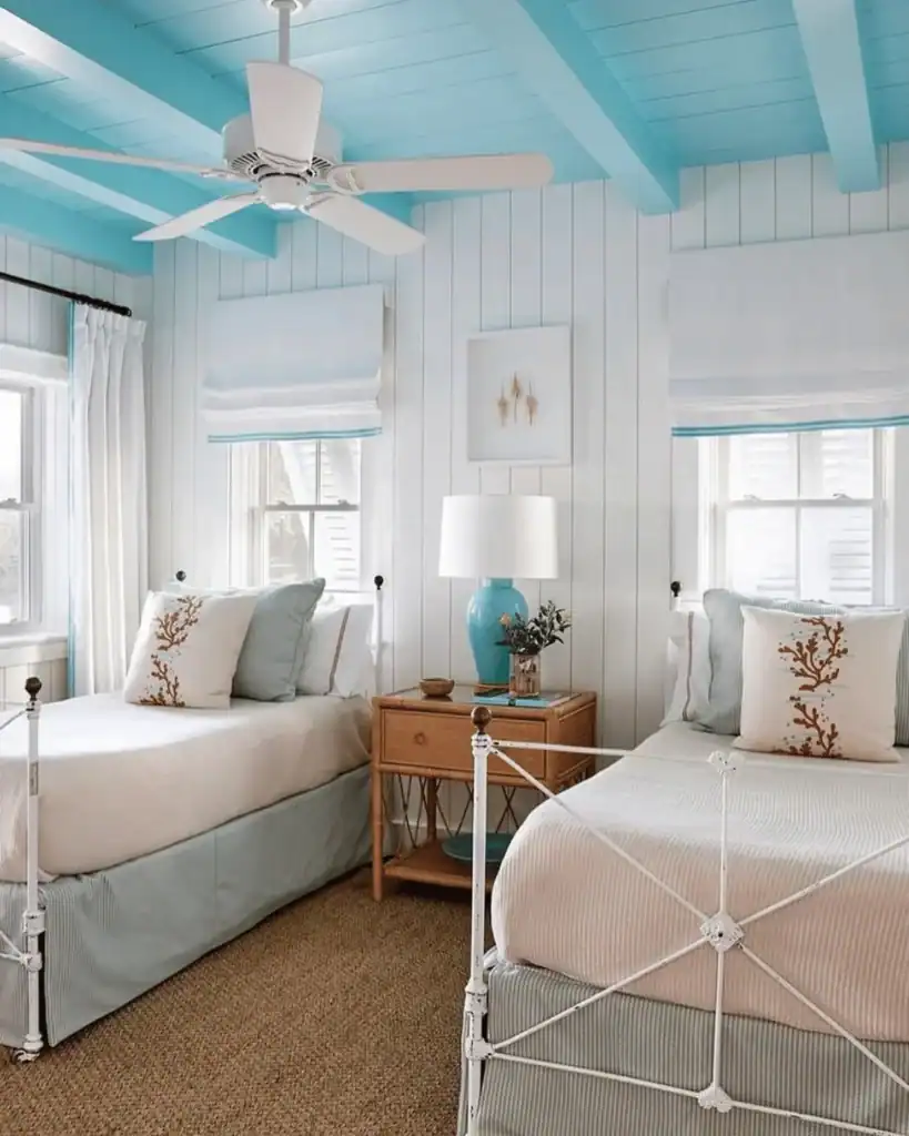 beachy bedroom with a blue ceiling