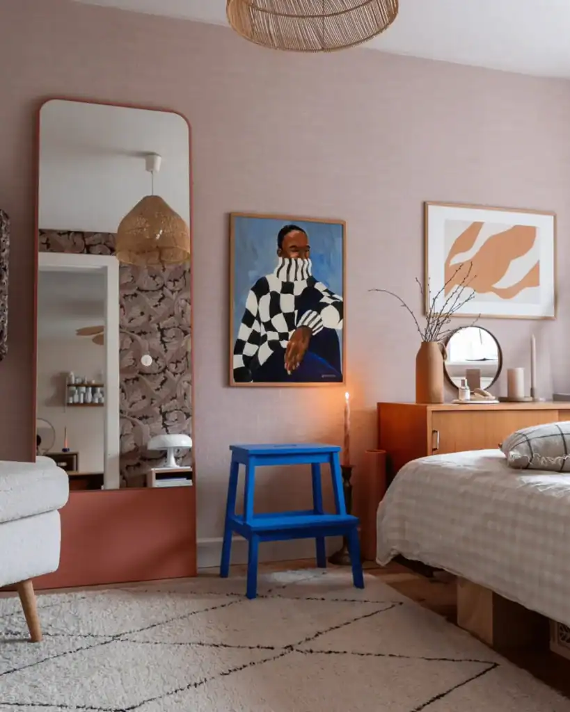 contemporary bedroom with pop of terracotta and blue accents. mood-boosting decor ideas