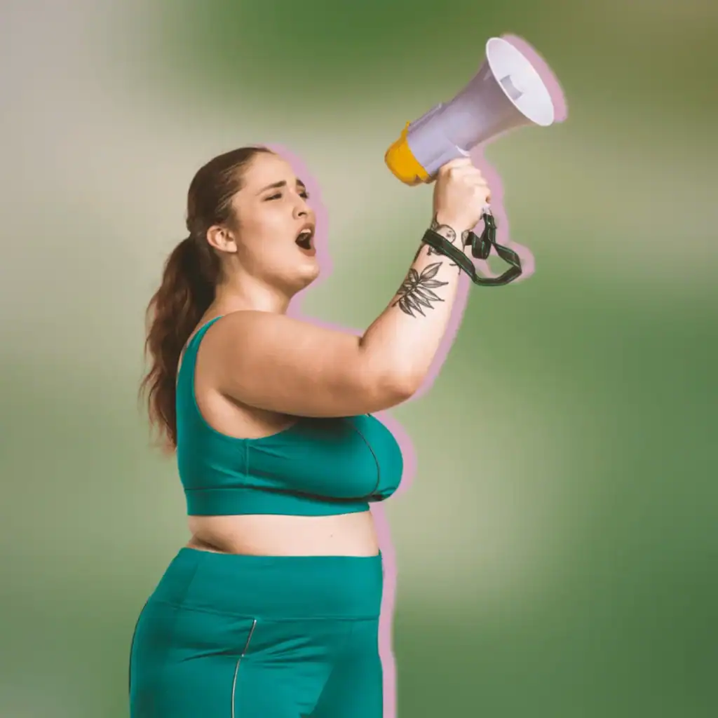 Curvy-woman-with-a-ponytail-shouts-though-a-megaphone