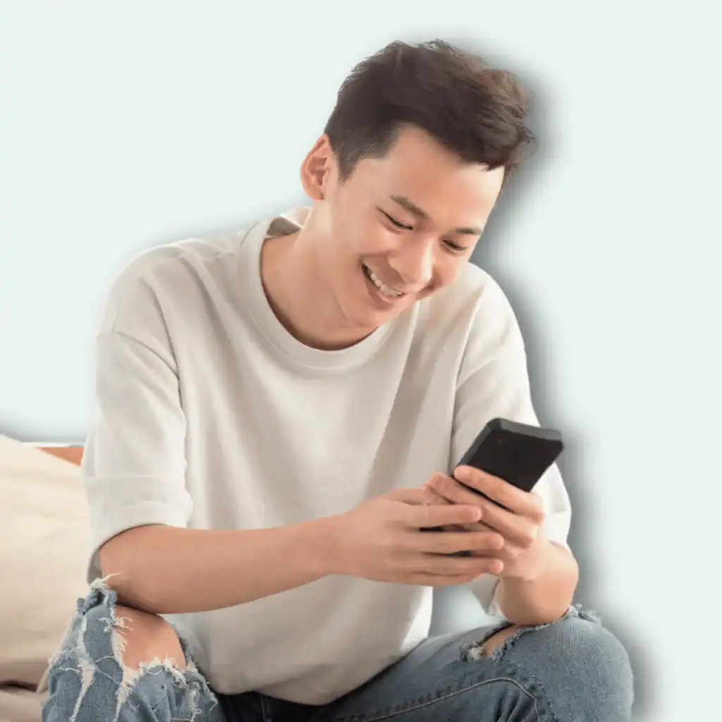 Man-smiling-at-his-phone.-Good-Morning-and-Love-Quotes