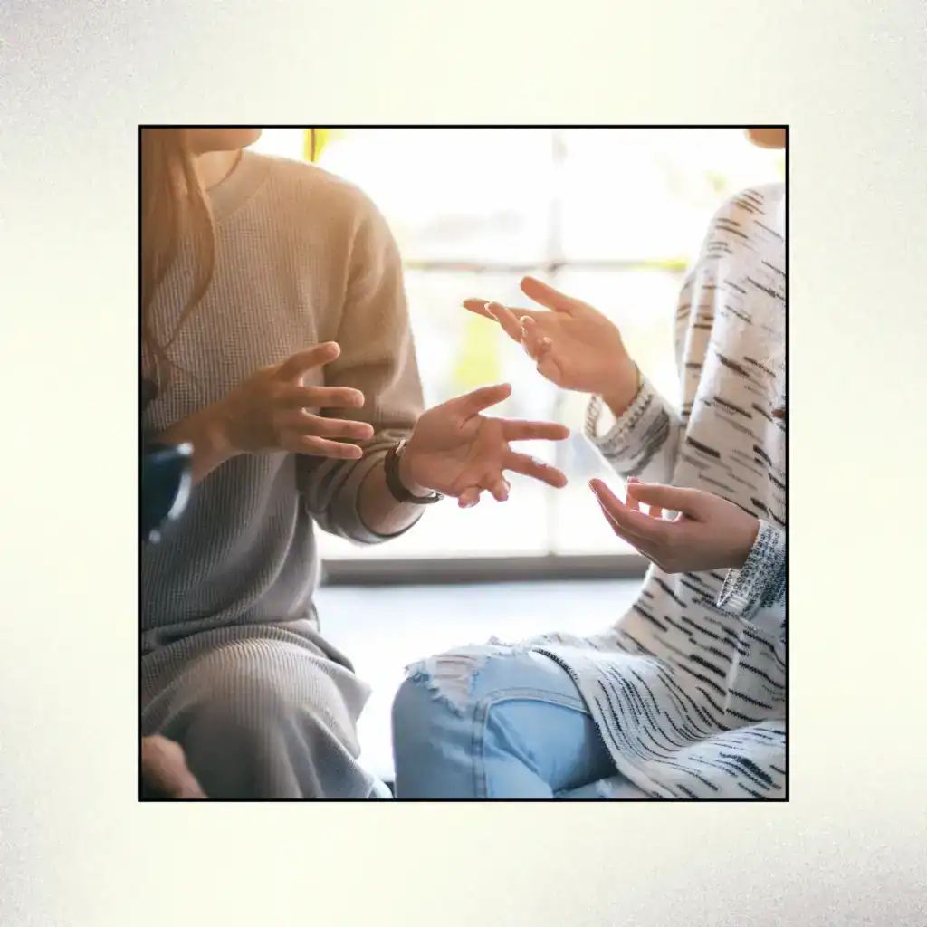 People-sitting-and-talking-together.-How-To-Set-Healthy-Boundaries-With-Friends