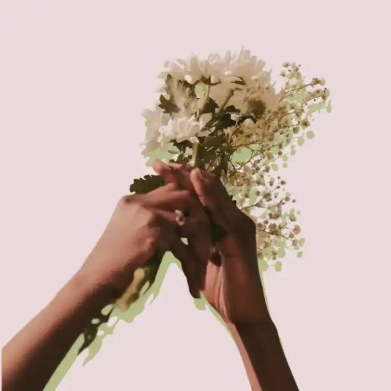 Self-Care-Morning-Rituals.-Womens-hands-holding-flowers