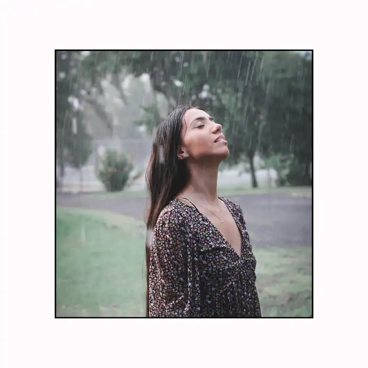 Woman-Standing-in-the-Rain.-15-Signs-Of-High-feminine-Energy