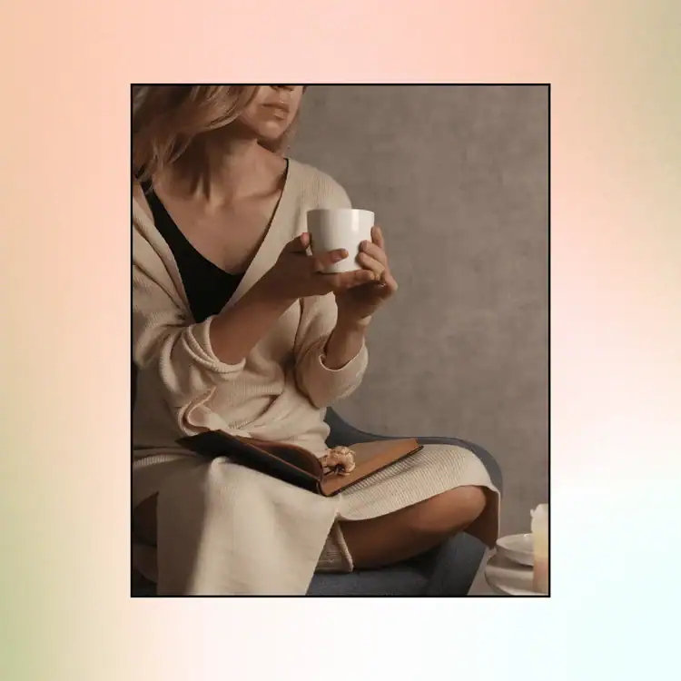 50+ Positive Affirmations For Discipline & Focus. Woman-drinking-warm-drinkreading-a-book-dreaming.-Positive-Affirmations-For-Discipline