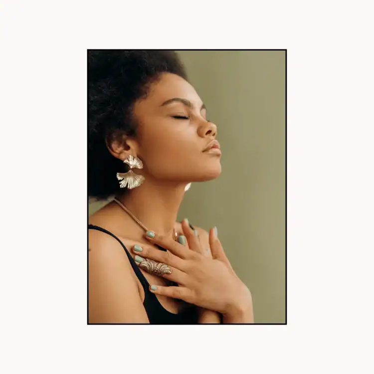 Woman-in-Black-Spaghetti-Strap-Top-Meditating.-Saturday-selfcare-ideas