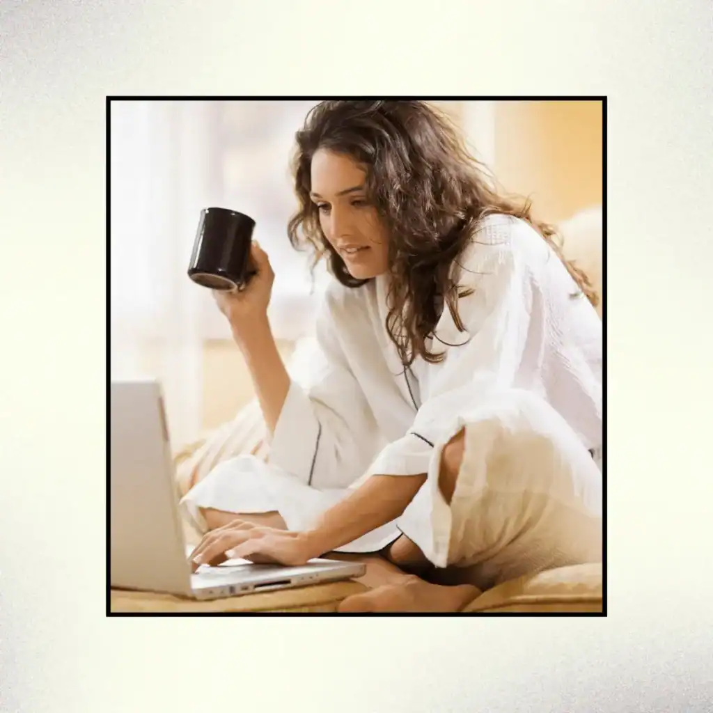 Woman-working-at-home-with-laptop-computer.-Scripting-Manifestation-Technique