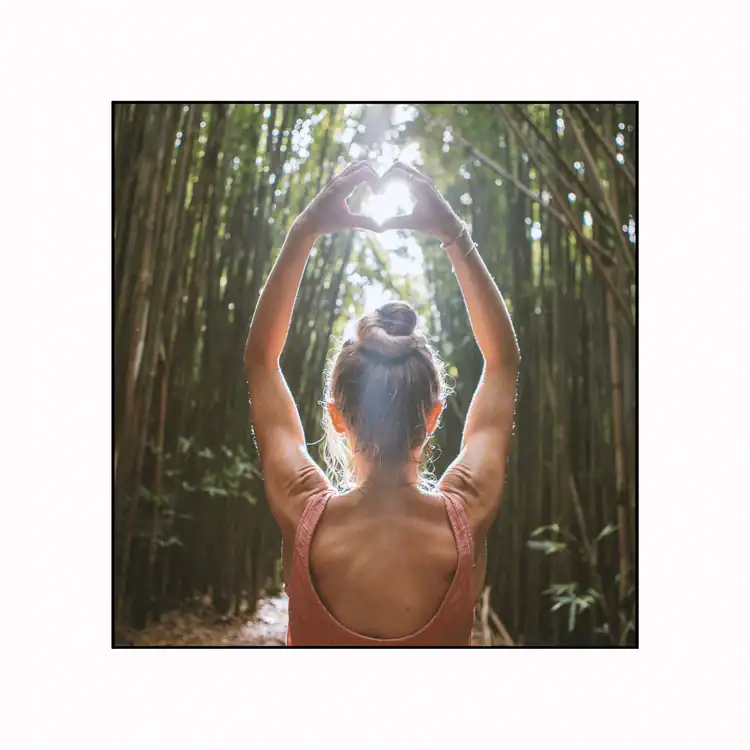 Young-woman-in-bamboo-forest-loving-nature.-15-Signs-Of-High-Feminine-Energy
