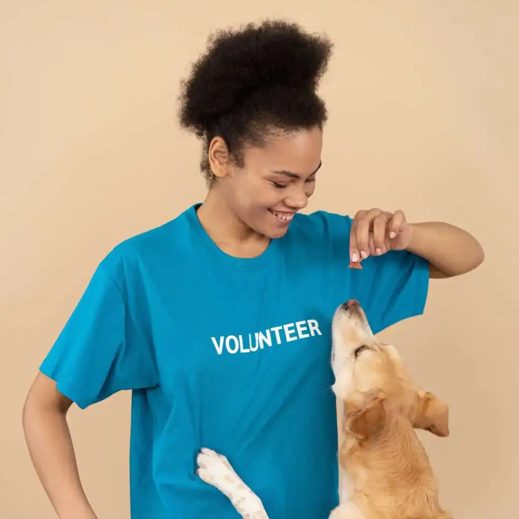a-female-volunteer-feeding-a-dog-1024x1024-1