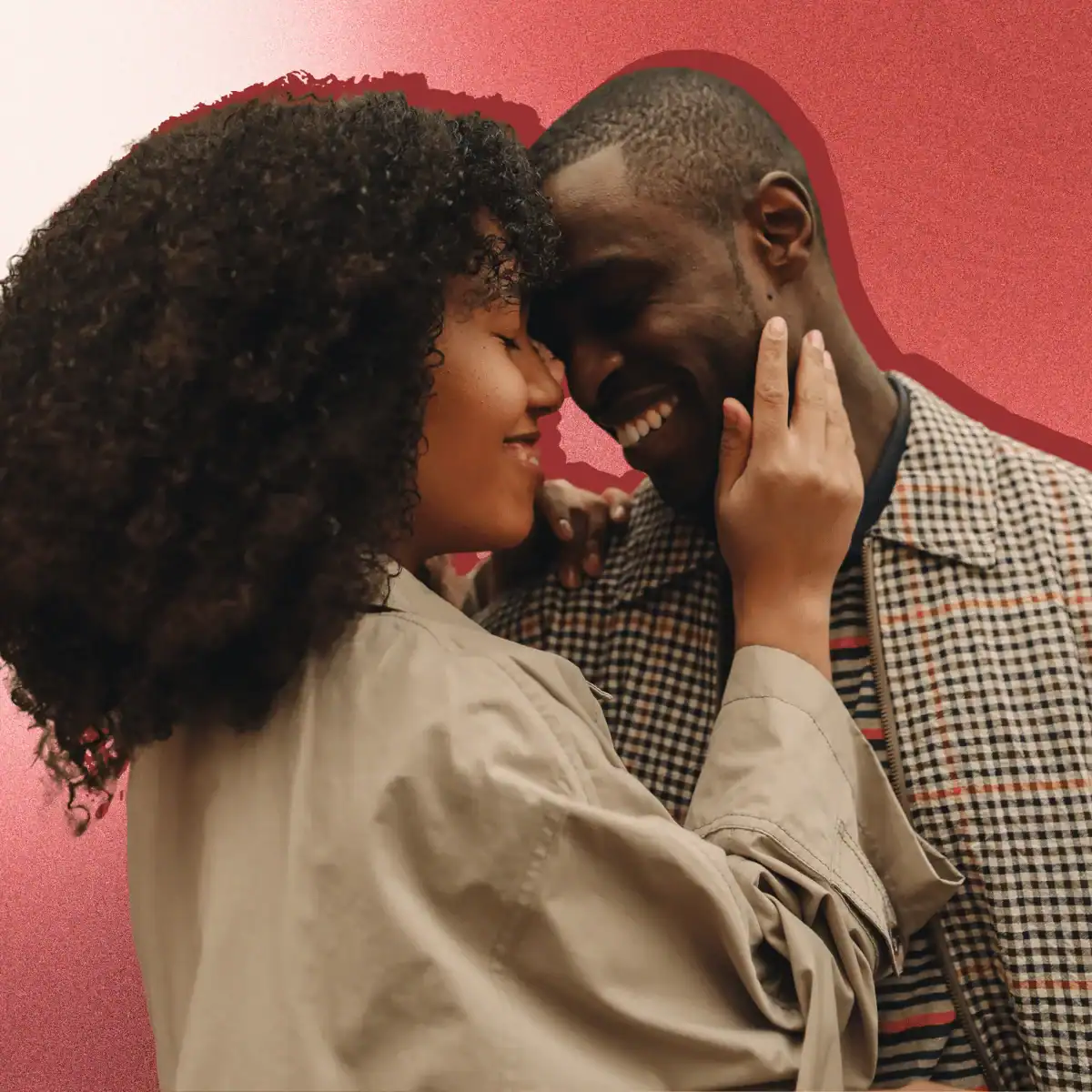 young-couple-wearing-beige-autumn-coats-embracing-each-other-and-smiling