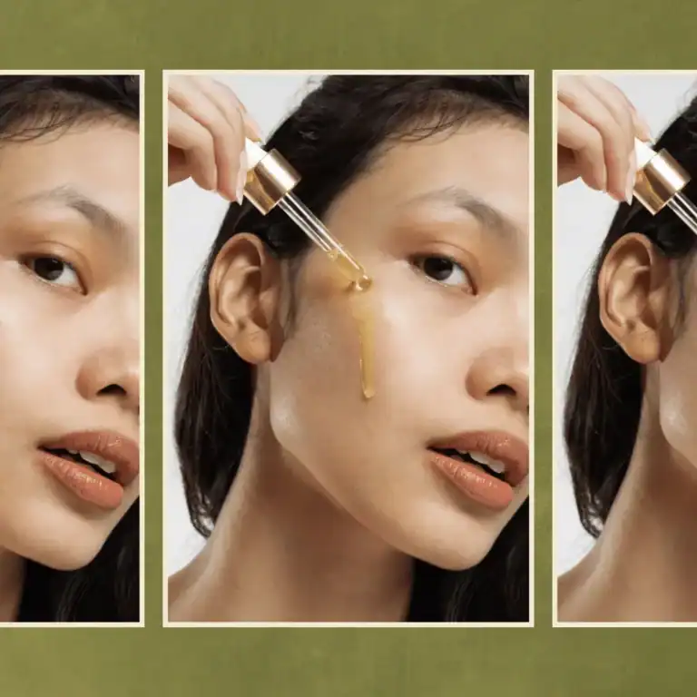Asian woman applying a CBD oil to her face using a pipette