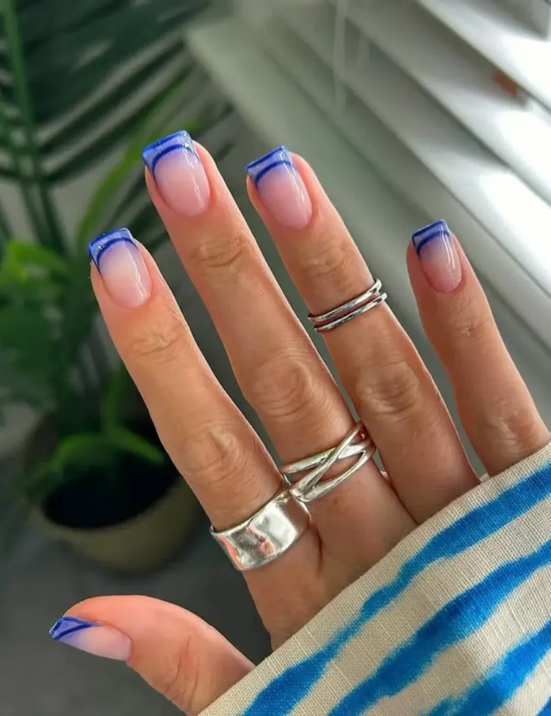 Electric Blue French Tips. blue winter nails